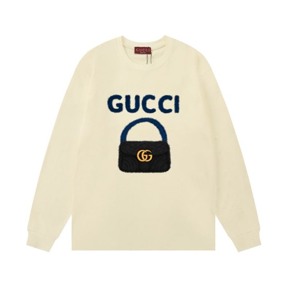 Gucci accessible luxury handbag with logo lettering, long-sleeved bodysuit.